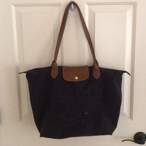Used longchamp tote in eggplant